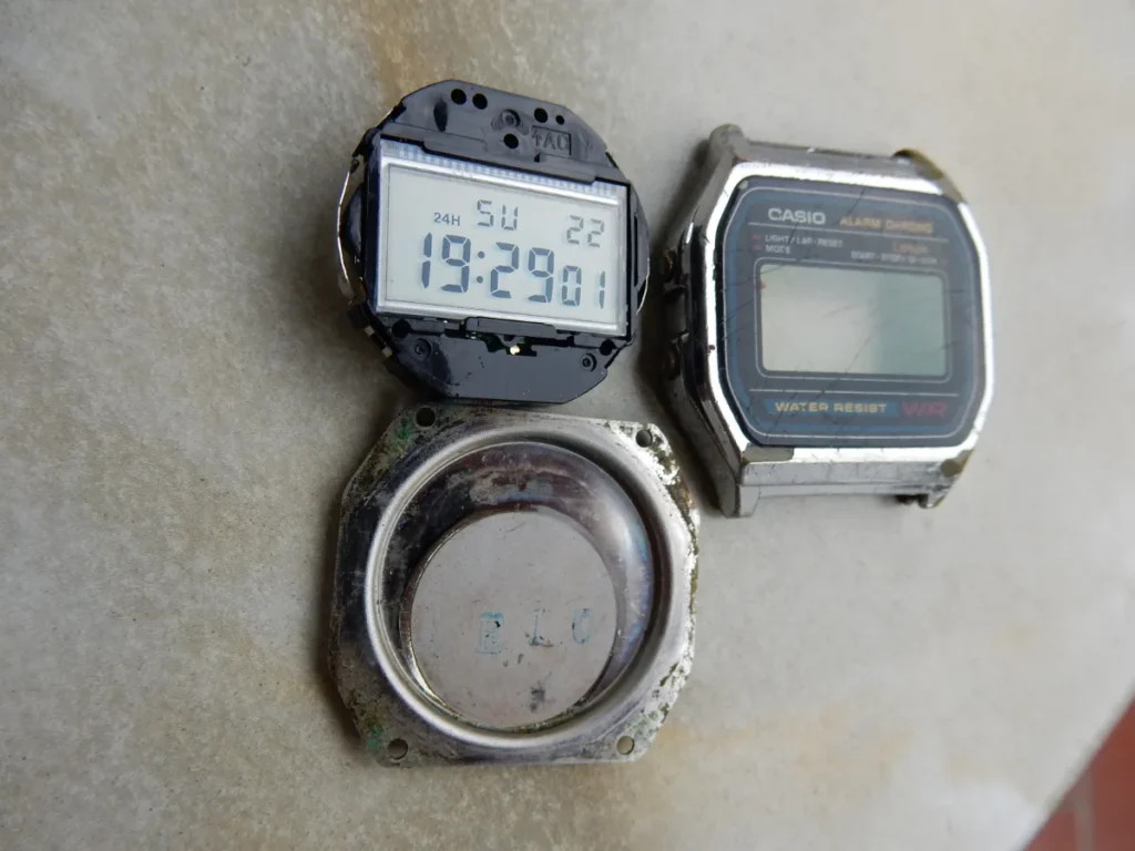Casio A158W digital watch with steel bracelet, front view