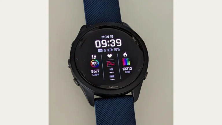 Garmin Forerunner 265 GPS running watch with blue band on white background
