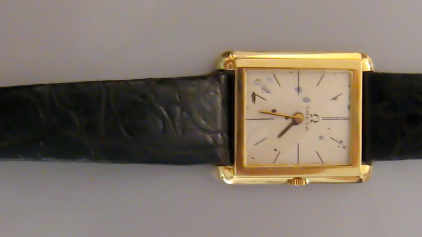 John F. Kennedy's gold Omega Ultra Thin 'Stockdale' watch with black leather strap