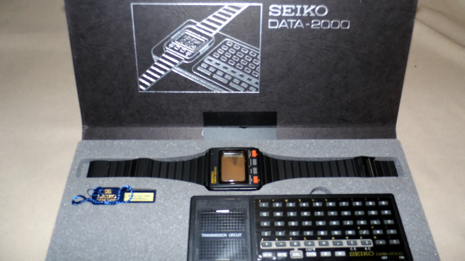 Seiko Data-2000 LCD computer watch with its docking keyboard, circa 1983