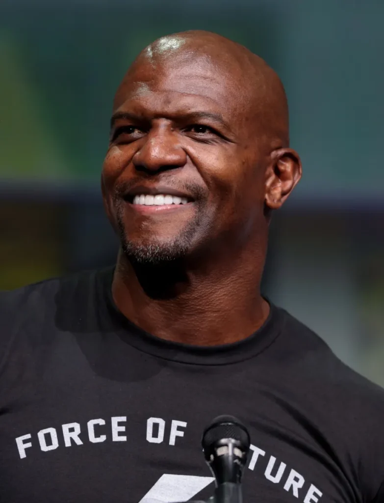 Terry Crews smiling at a public event